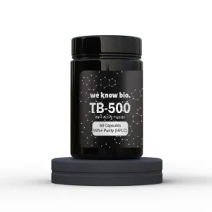 Black bottle labeled TB-500 by We Know Bio on a dark circular pedestal; label notes 60 capsules and 99% purity (HPLC).